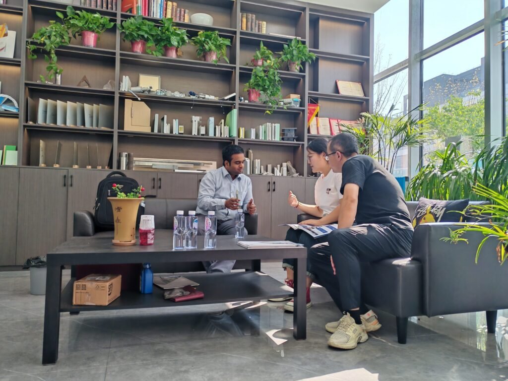 Face-to-face consultation at OSIDEK headquarters with an international client, discussing customized medical engineering and radiation shielding project requirements.